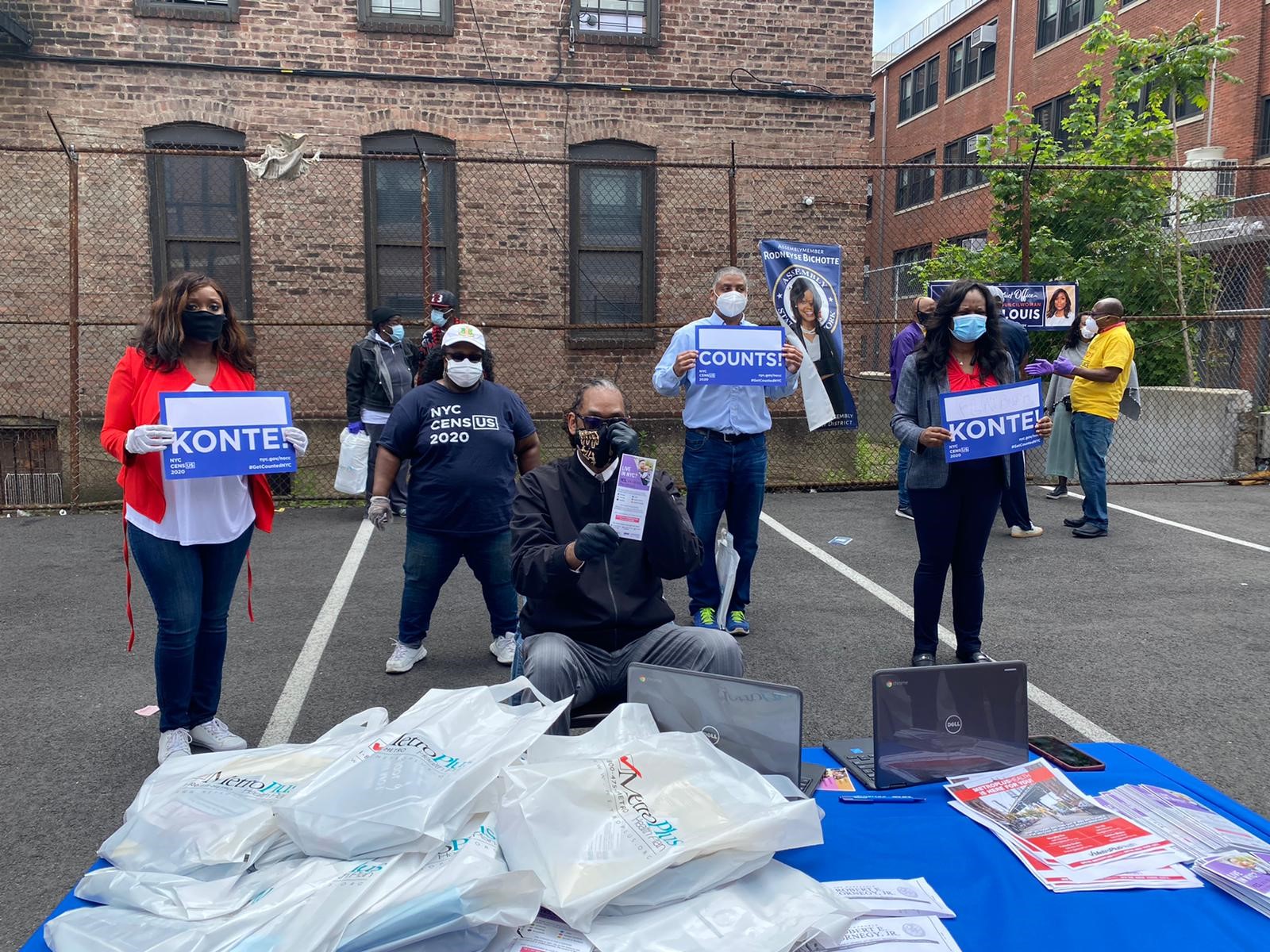 Assemblymember Bichotte (right), Council Member Farah N. Louis (left), Council Member Robert E. Cornegy, Jr. (center), and District Leader Edu Hermelyn are together at the Little Haiti BK Mask Distribution event on May 25, 2020.