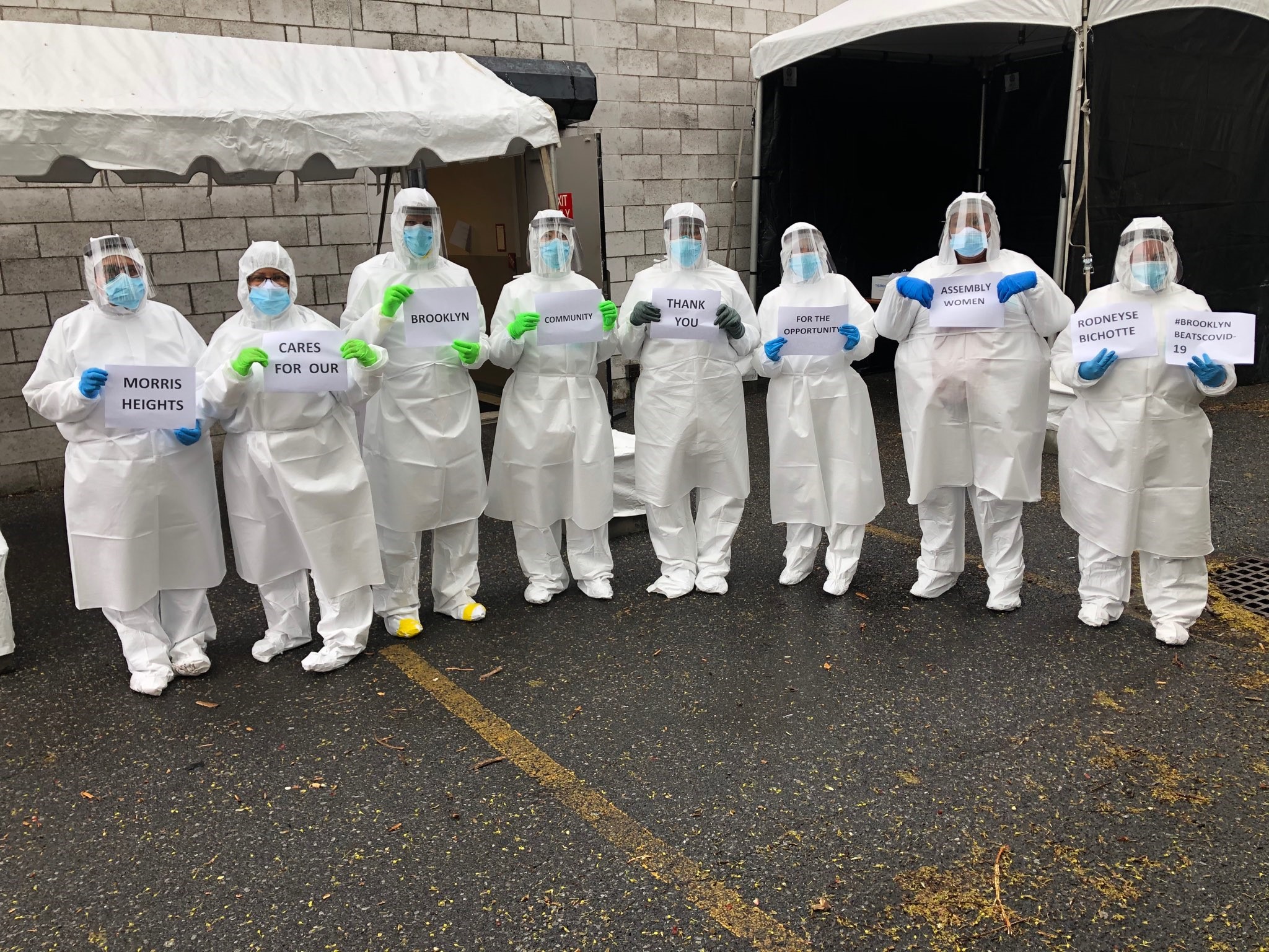 Staff at the Morris Heights Family Care Center show appreciation and give thanks to Assemblymember Rodneyse Bichotte at the opening of their COVID-19 testing site on March 2, 2020.