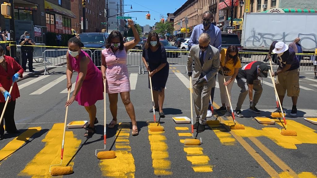 Assemblymember Bichotte, Assemblymember Tremaine Wright, New State 
Attorney General Letitia James, Council Member Robert Cornegy, Jr., Community Advocate and Leader Al Sharpton, Director & Actor Spike Lee with others at a Black Lives Matter street painting event at Bedford-Stuyvesant’s Restoration Plaza on 6/13/2020.