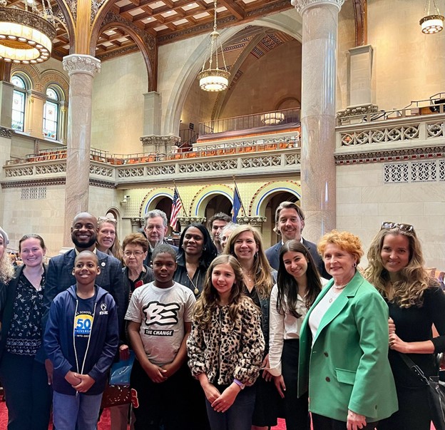 Assemblymember Jo Anne Simon with students, parents and advocates after dyslexia resolution.