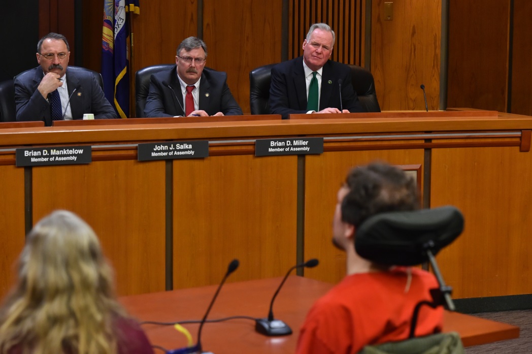 Assemblyman Michael Fitzpatrick (R,C,I,Ref-Smithtown) (right) and his Assembly Minority colleagues listen to testimony from advocates at a forum they held on home care support for those with developme