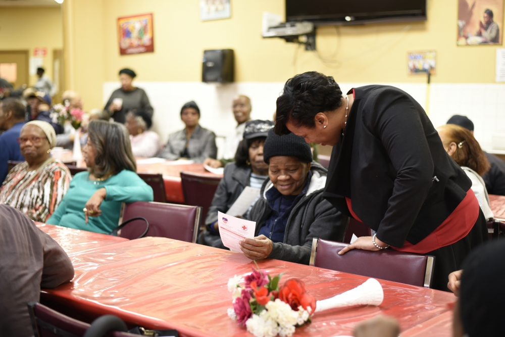 Assemblywoman Hyndman distributes fire alarms at senior center with FDNY