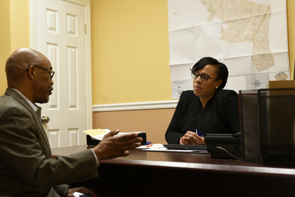 Assemblywoman Hyndman discussing educational issues with NYS Regent Lester Young.