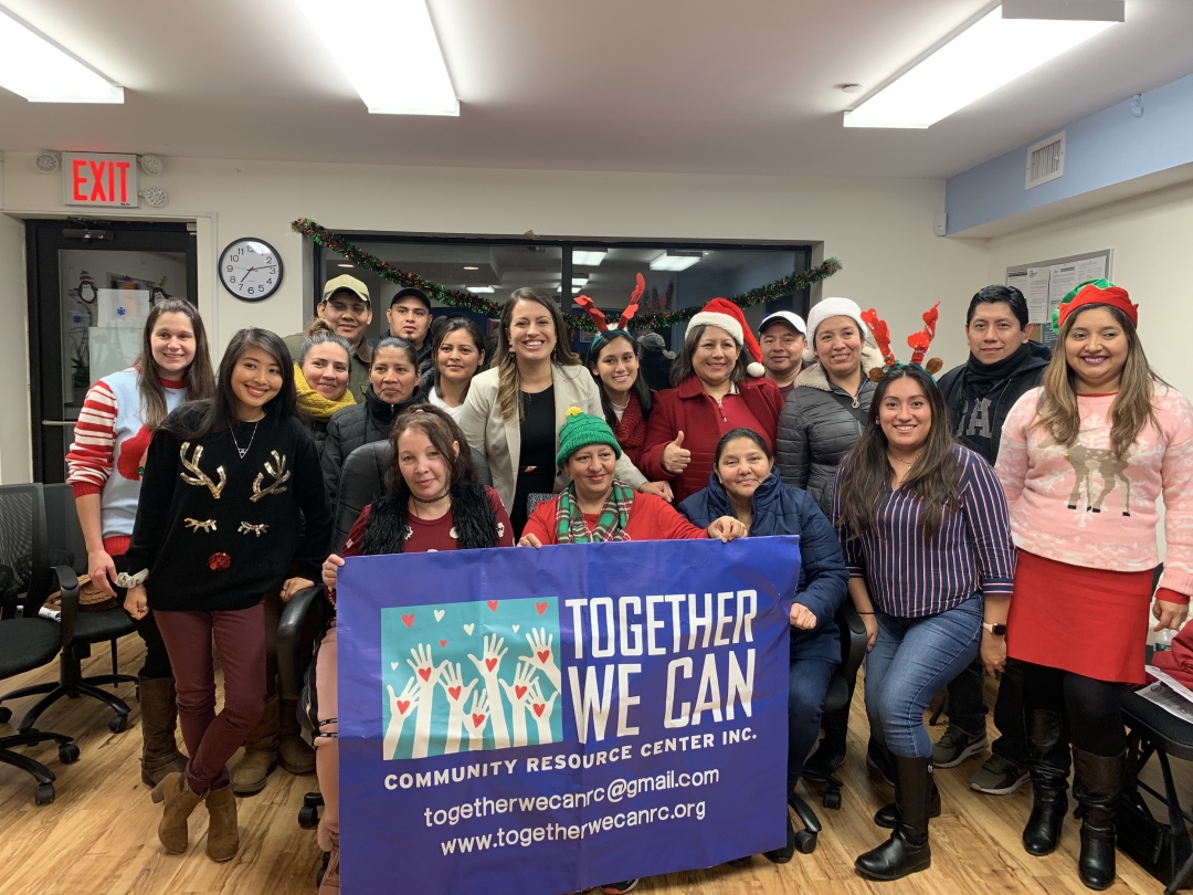 Assemblywoman Cruz with parents of the youth who participated in the gingerbread houses event.