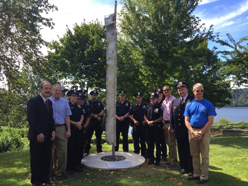 Assemblyman Dinowitz participated in a dedication ceremony where an artifact from the World Trade Center became a permanent memorial. Pictured are Assemblyman Dinowitz,  Councilmember Andrew Cohen, Co