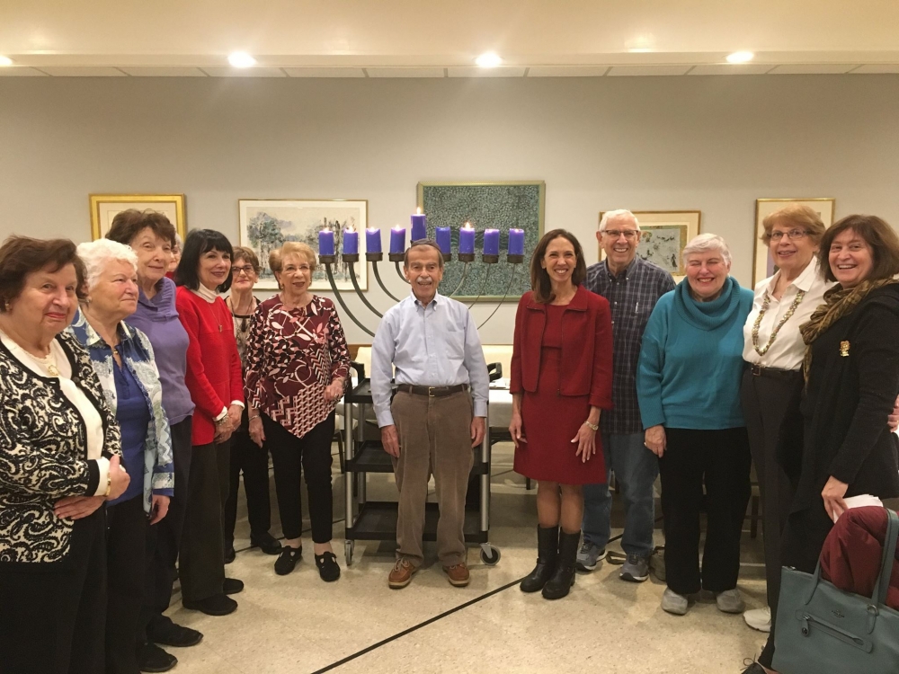 Assemblywoman Amy Paulin gave out holiday cookies and lit the menorah at Beth-El Synagogue Center in New Rochelle.