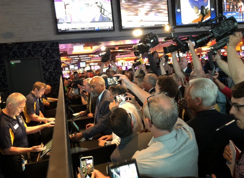 Assemblyman J. Gary Pretlow the Racing and Wagering Chair makes the first legal sports bet in New York at Rivers Casino & Resort sports book opening in Schenectady, New York.