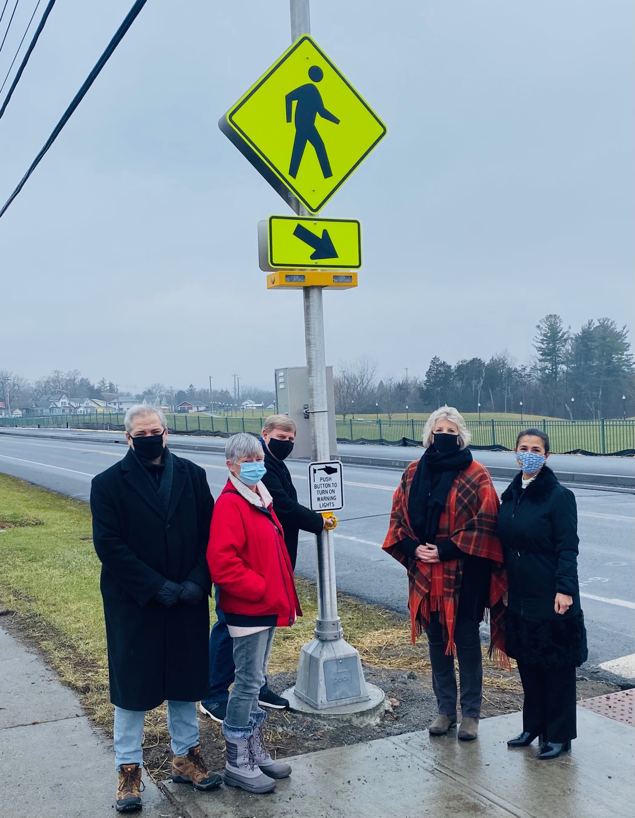 Assemblymember Barrett unveils a new solar-powered crosswalk in Hudson with representatives of the Hudson City School District and Hudson Common Council. From left – City of Hudson Fifth Ward Alderman