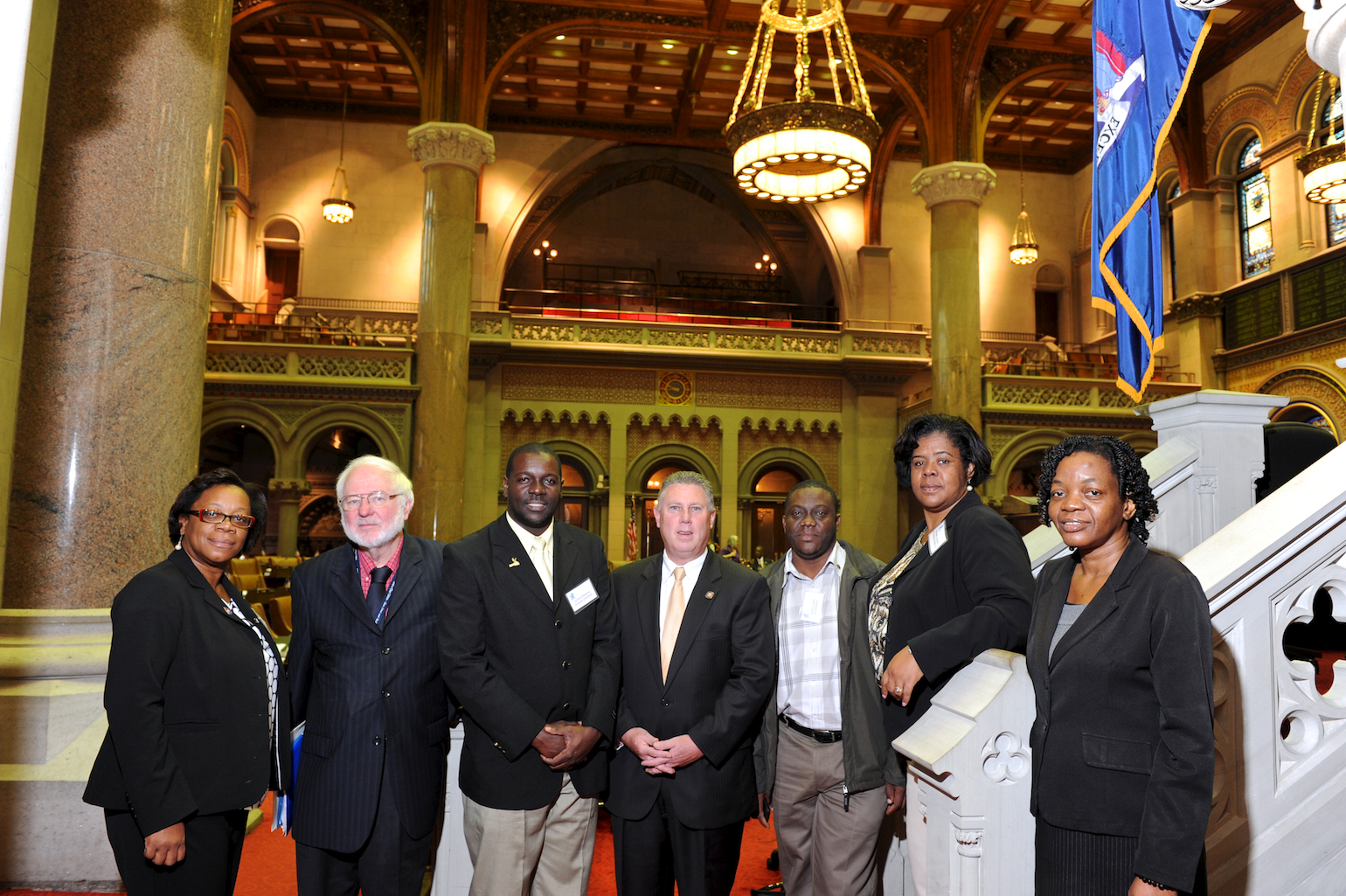 Assemblymember McDonald welcomes delegates from Jamaica from the International Center of the Capital Region to the Assembly Chambers.