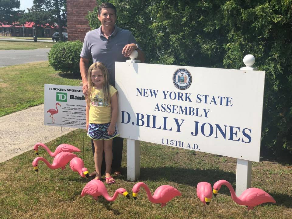 Assemblyman Billy Jones’ office was “flocked” by North Country Cancer Fund during their first annual Summertime Flamingo Flocking in July 2019. The “flocking” helps raise fund