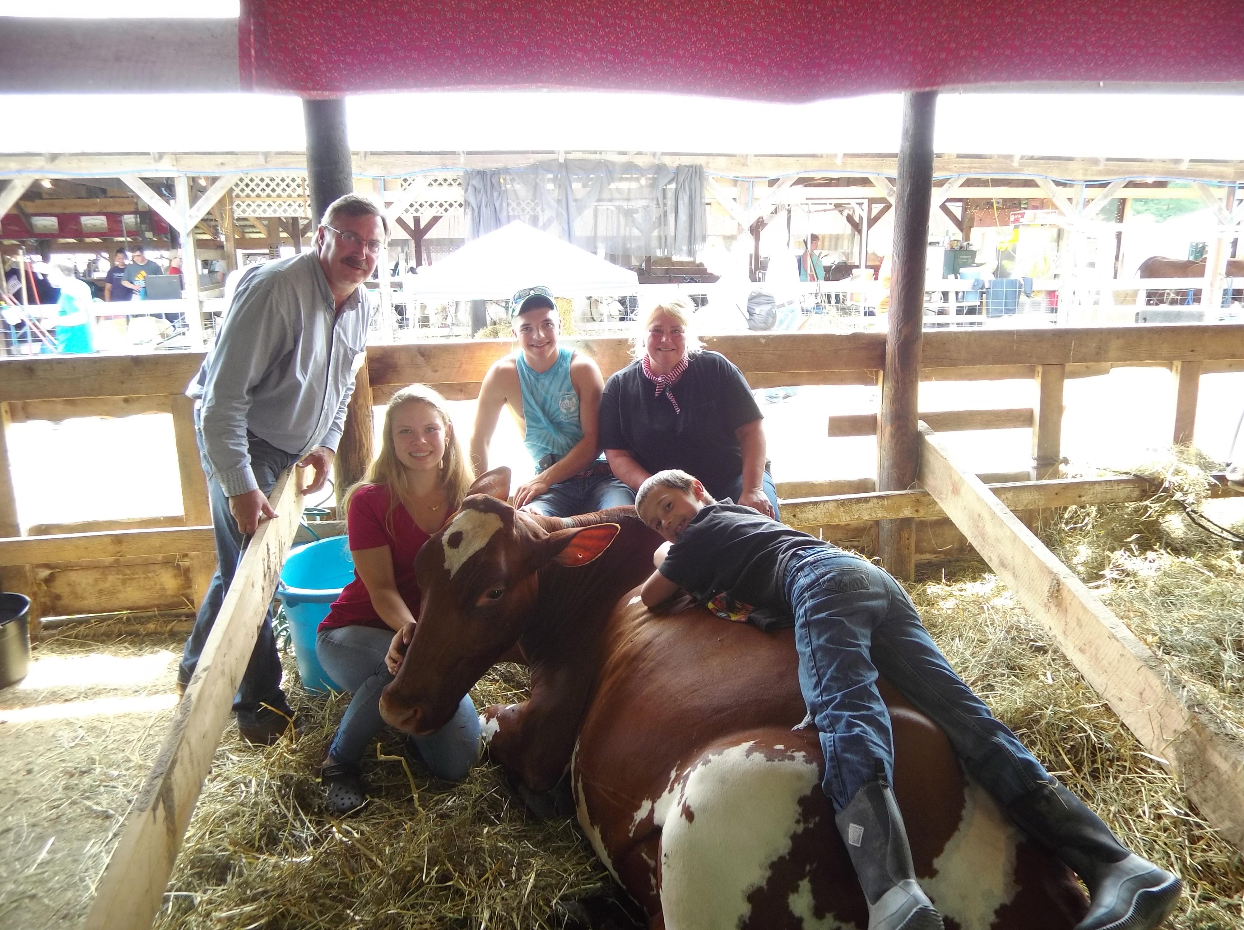 (Left to right): Assemblyman Brian Miller, Alexi Baran, Payton Stirone, Shelly Schaffer (Front – on cow): Jonathan Latour