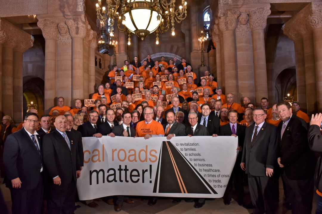 Assemblyman Brian Miller rallies for increased funding for local roads and bridges with highway superintendents from across the state on March 6, 2019 in Albany.