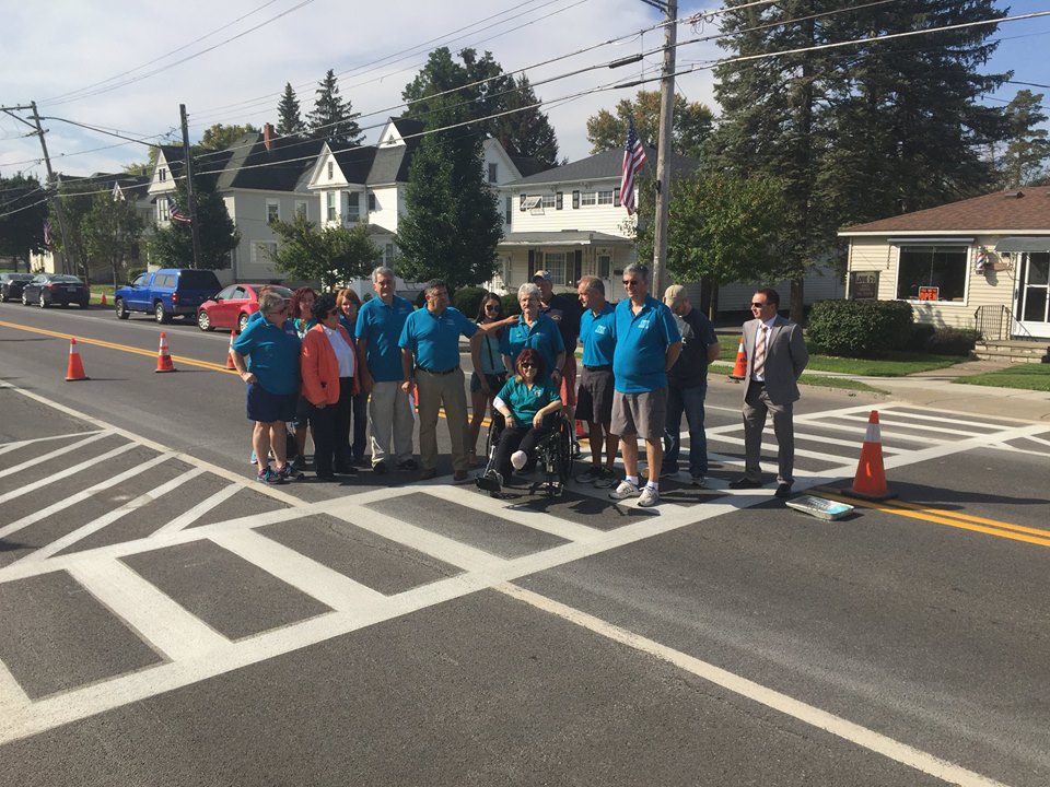 Assemblyman Al Stirpe helped raise awareness about ovarian cancer by assisting Hope for Heather in their efforts to paint the village teal in Minoa