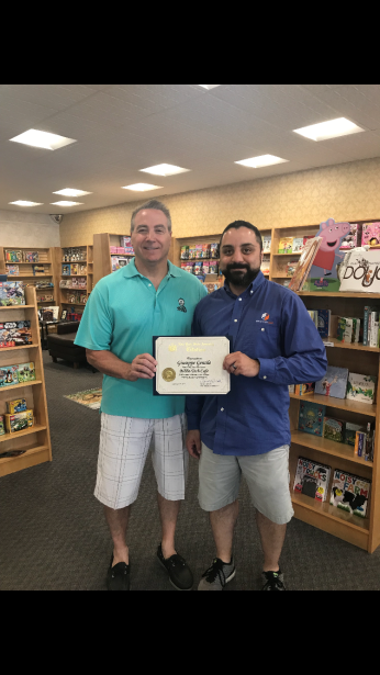 Assemblyman David DiPietro (R,C,I-East Aurora) and the new owner of Biblio Tech Café Giuseppe Gentile