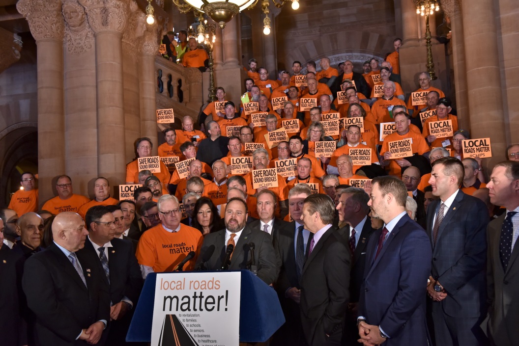 Assemblyman Joe DeStefano (R,C,I,Ref-Medford) stands alongside highway workers on Wednesday, March 6.