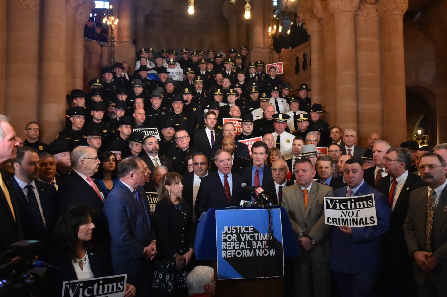 (Left to right) Assemblyman Joseph M. Giglio (R,C,I-Gowanda), Assemblyman Christopher S. Friend (R,C,I-Big Flats), Assemblyman Phil Palmesano (R,C,I-Corning), Assemblywoman Marjorie Byrnes (R,C-Caledonia), Steuben County District Attorney Brooks Baker, Se