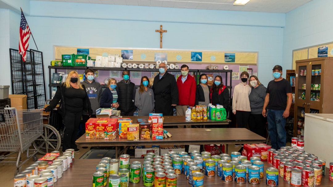 Assemblyman John Mikulin (R,C,I-Bethpage) with (from left to right) Mary Klockler, Liam Klockler, Diane Sabino, Fr. Francis, Lisa Savallo, Town of Hempstead Councilman Dennis Dunne, Mikulin, Emma Rochanakit, Leah Rochanakit, Bridget Thearle, Christine The